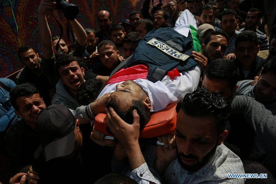 MIDEAST-GAZA-FUNERAL-JOURNALIST