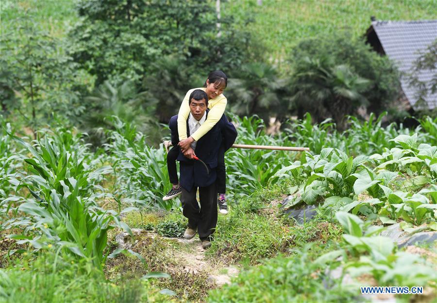 CHINA-CHONGQING-DISABLED FEMALE FARMER (CN)