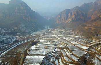 Scenery of snow-covered terraced fields in north China's Hebei